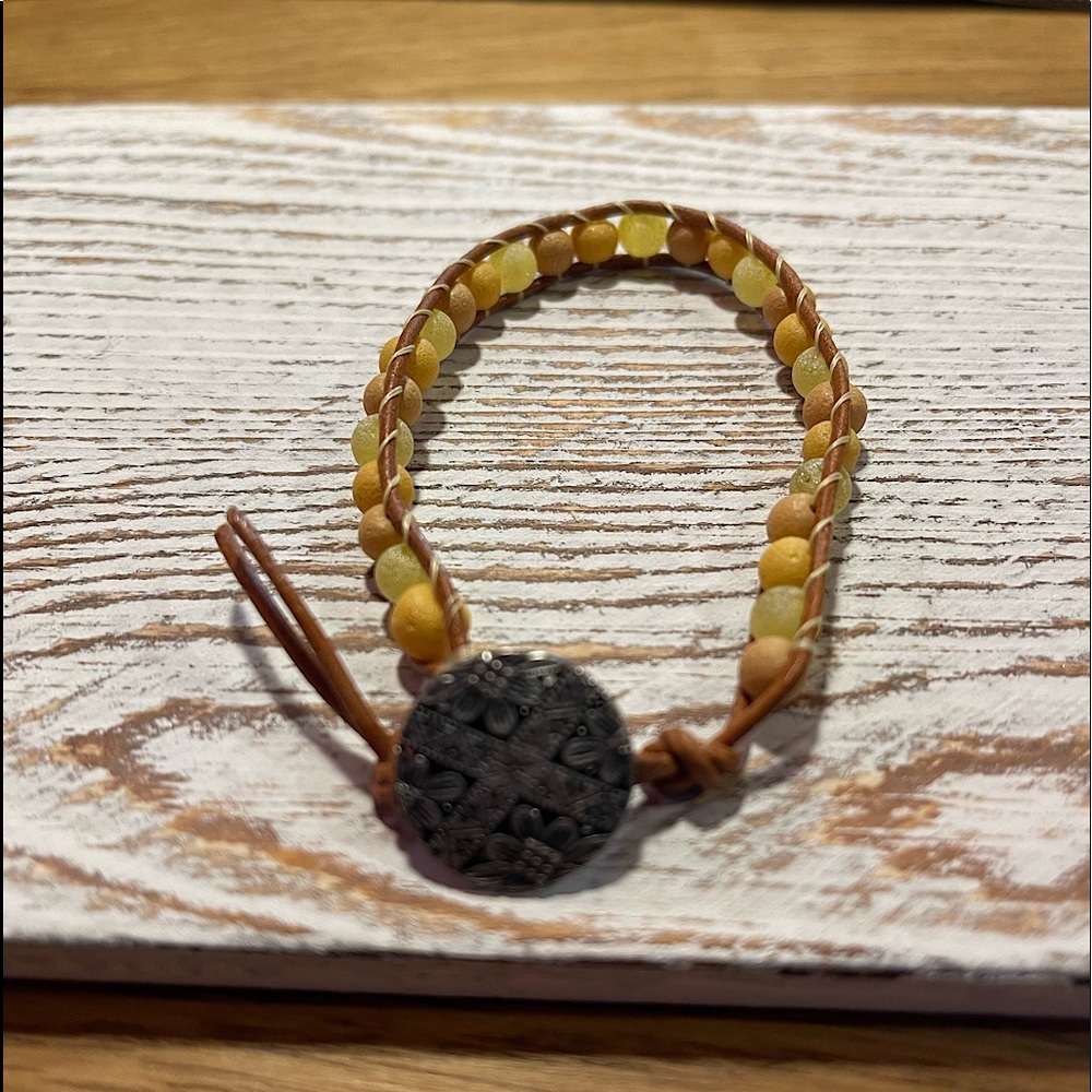 Handmade, one of a kind beaded leather wrap bracelet.